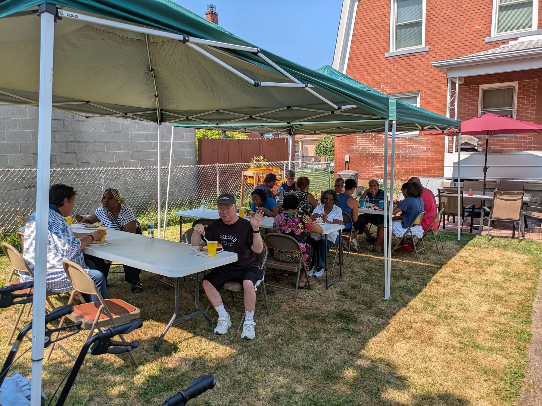 The McKees Rocks Assembly church family sharing a meal together